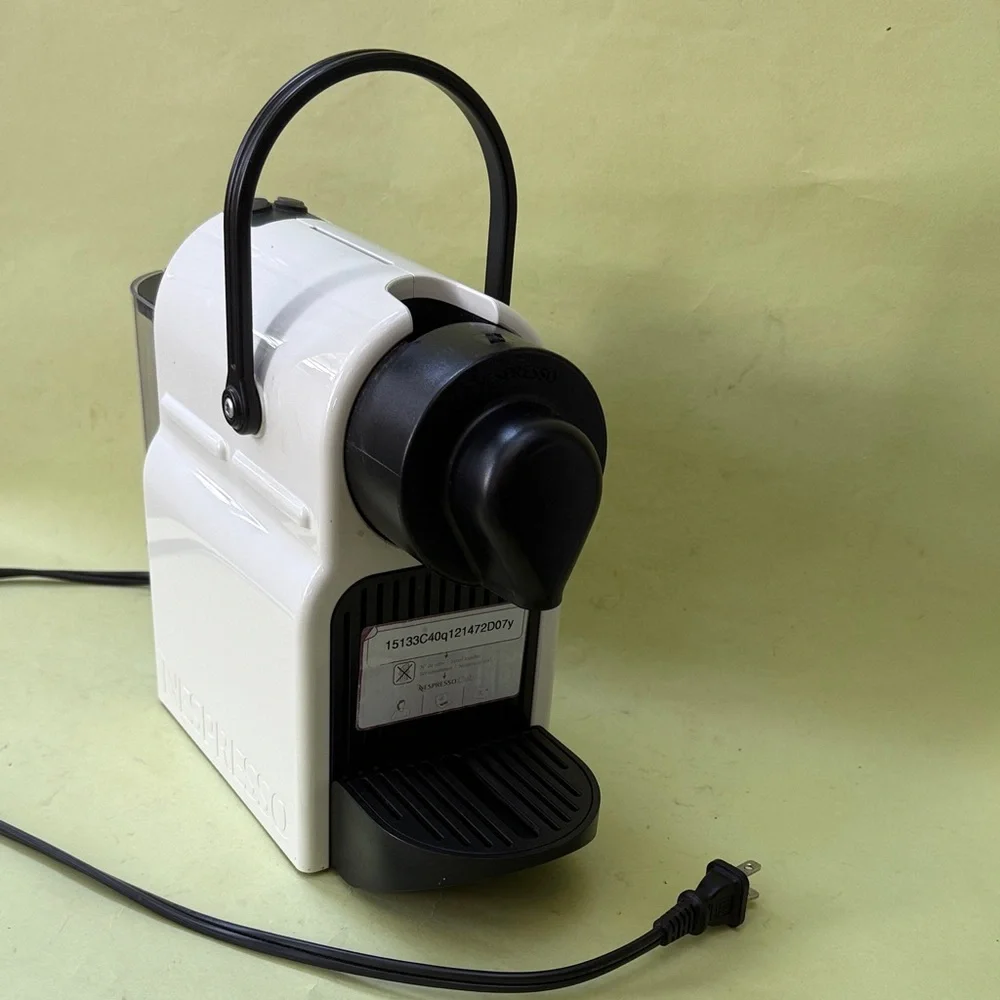 Nespresso White and Black Coffee Maker